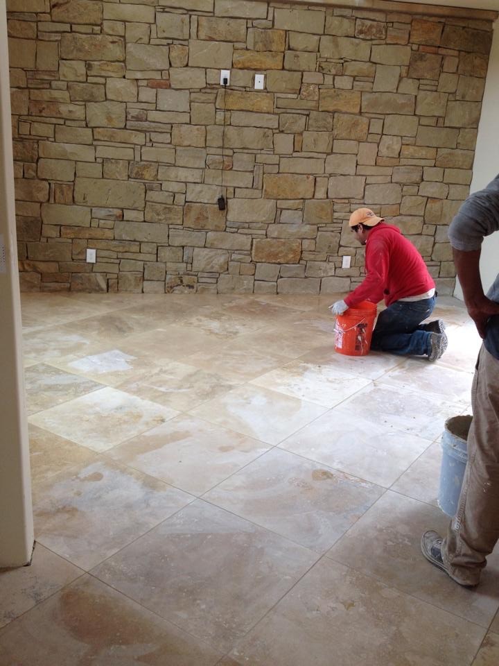 Inspiration for a rustic entryway remodel in Austin
