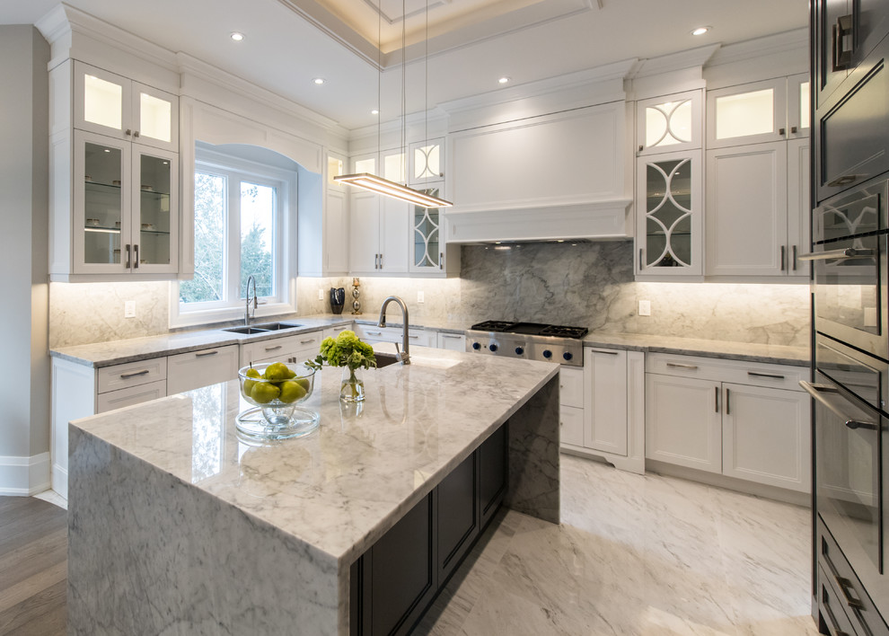 Example of a transitional kitchen design in Toronto