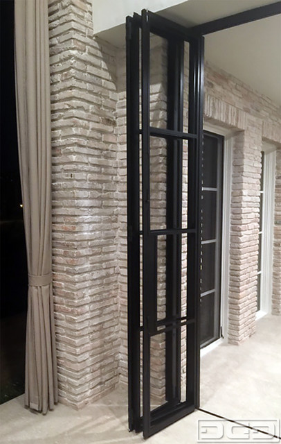 Panoramic Accordion Patio Doors In A Bronze Metal Frame