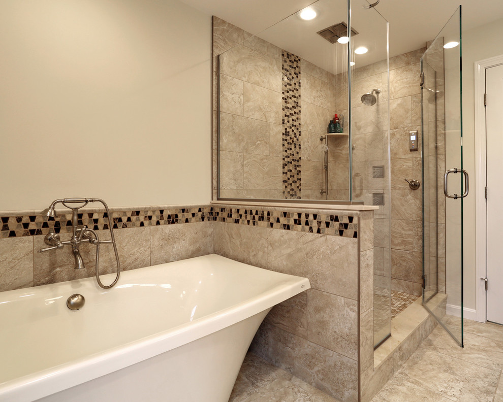 Inspiration for an expansive transitional master bathroom in Boston with furniture-like cabinets, dark wood cabinets, an undermount sink, granite benchtops, a freestanding tub, a corner shower, a one-piece toilet, beige tile, ceramic tile, beige walls and ceramic floors.