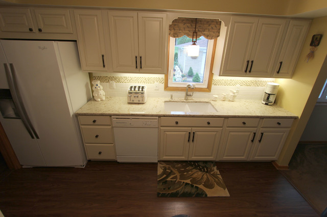 Cream Kitchen with Quartz Countertop - Traditional - Cleveland - by