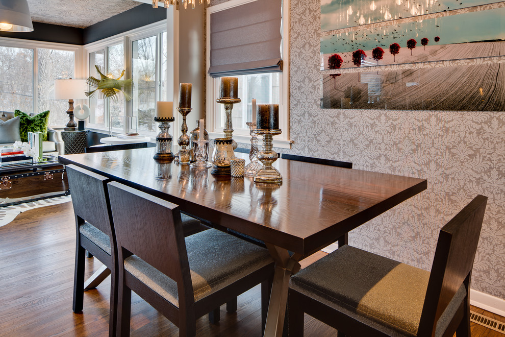 Eclectic dining room in Minneapolis with dark hardwood floors.