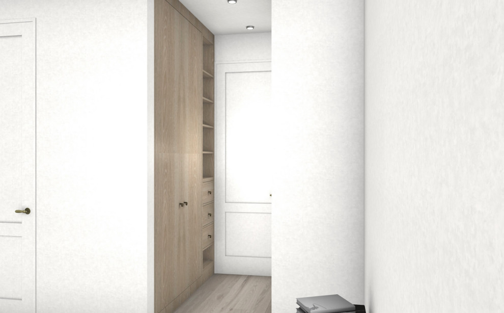 Design ideas for a mid-sized scandinavian storage and wardrobe in New York.