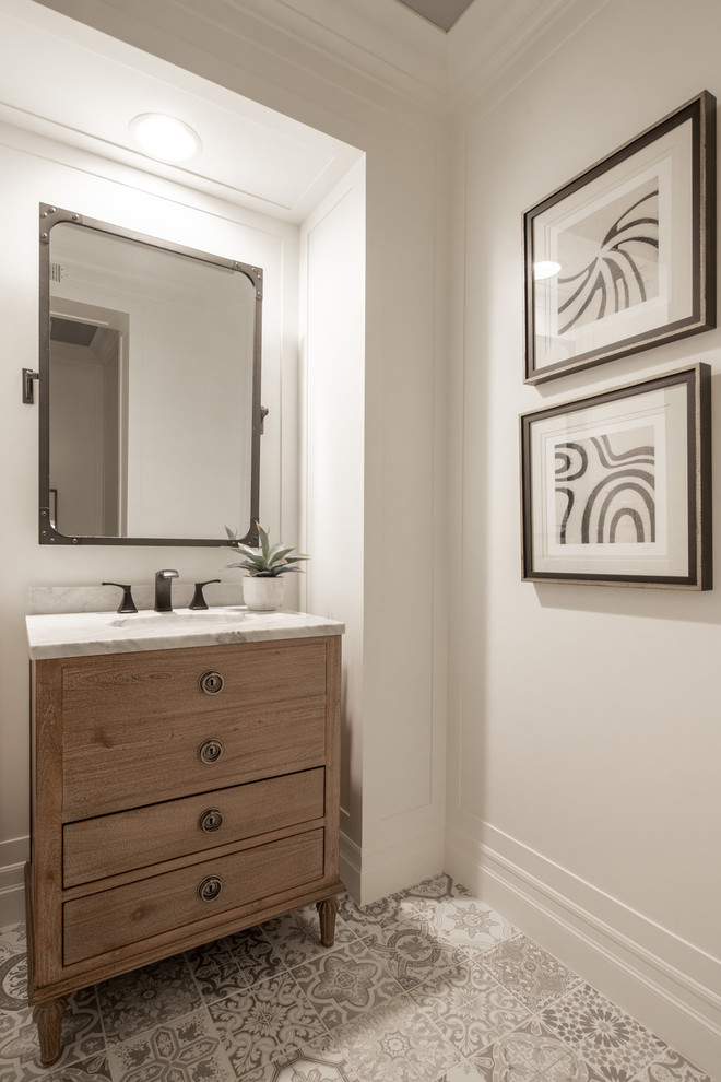 Transitional powder room in Orange County.