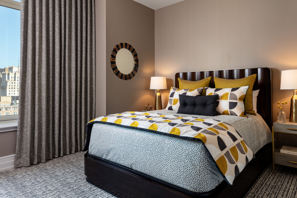 Immagine di una camera degli ospiti contemporanea con pareti beige e moquette