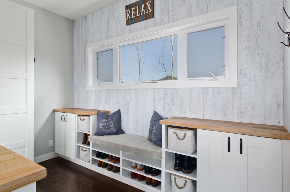 Beach style entryway photo in Calgary
