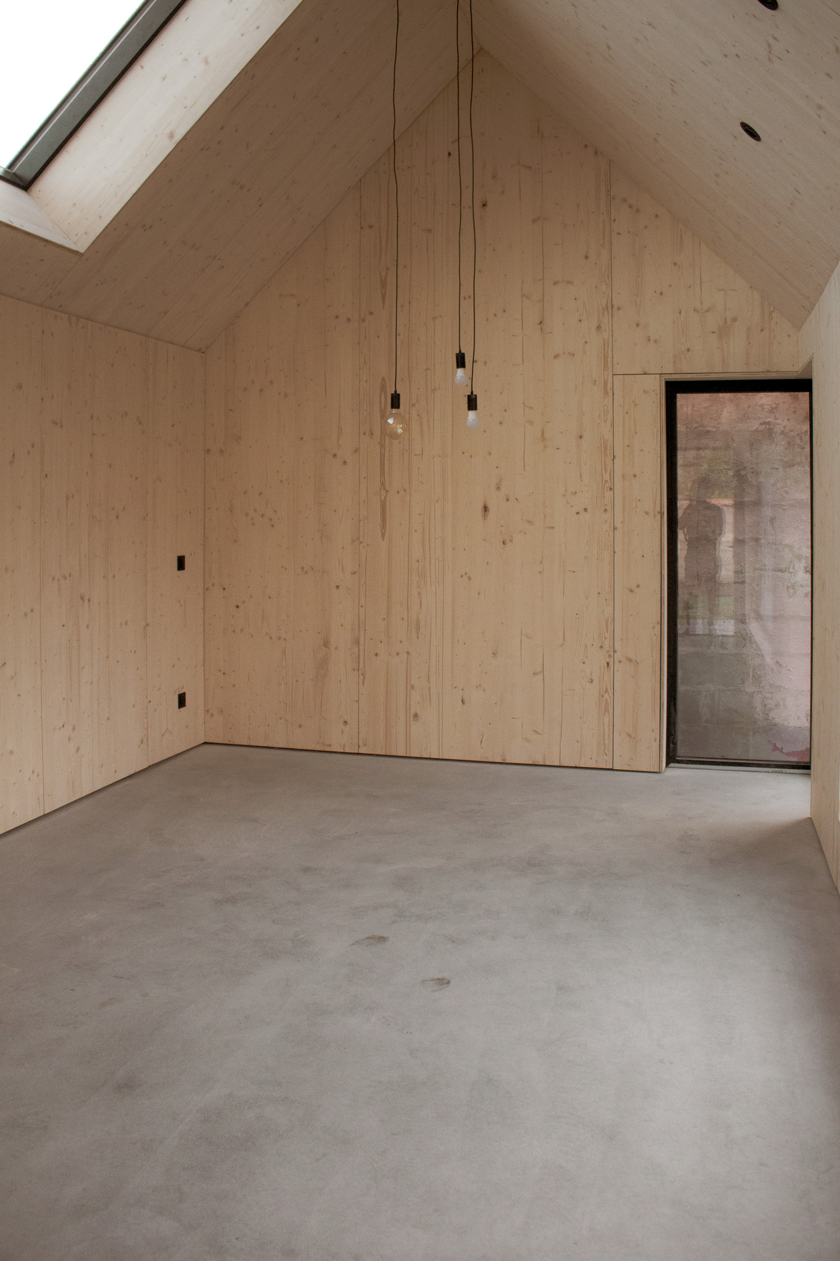 Transformation d'une remise en oratoire et aménagement paysager d'un béguinage