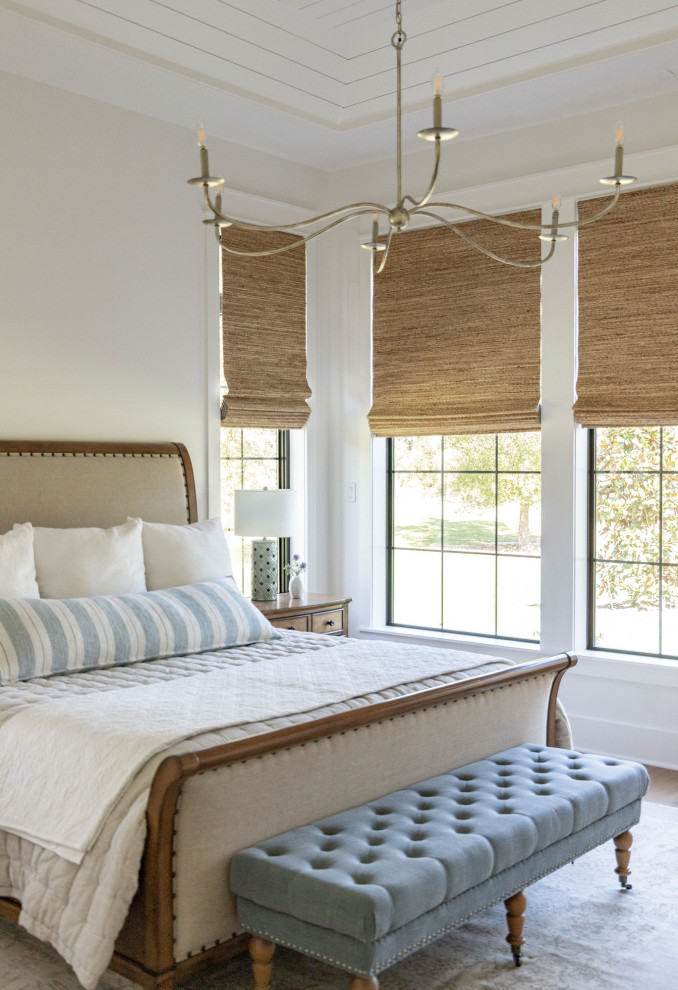 Photo of a large rural guest bedroom in Houston with white walls, light hardwood flooring, beige floors and a timber clad ceiling.