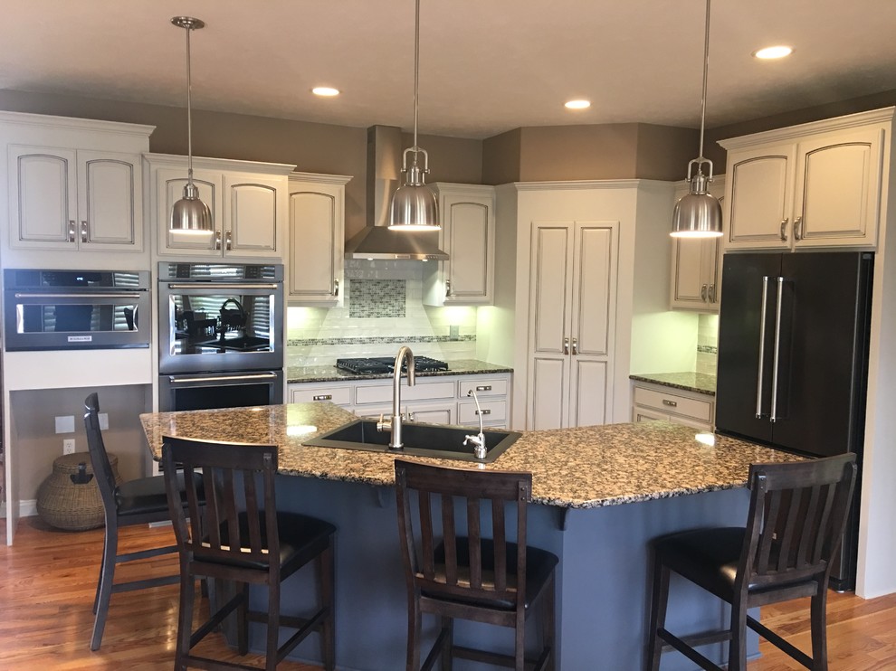 Example of a transitional kitchen design in Omaha