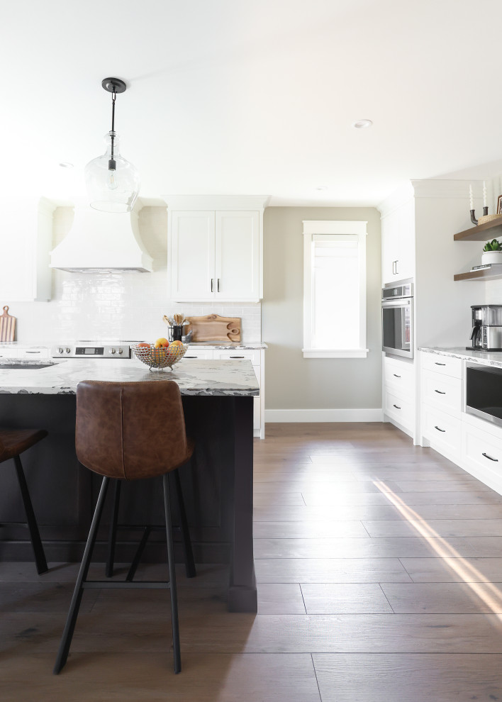 Example of a transitional kitchen design in Toronto