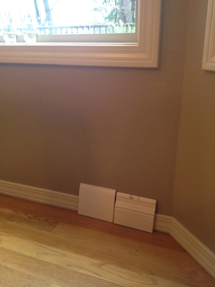 Design input selecting baseboards to match thinner door & window trim