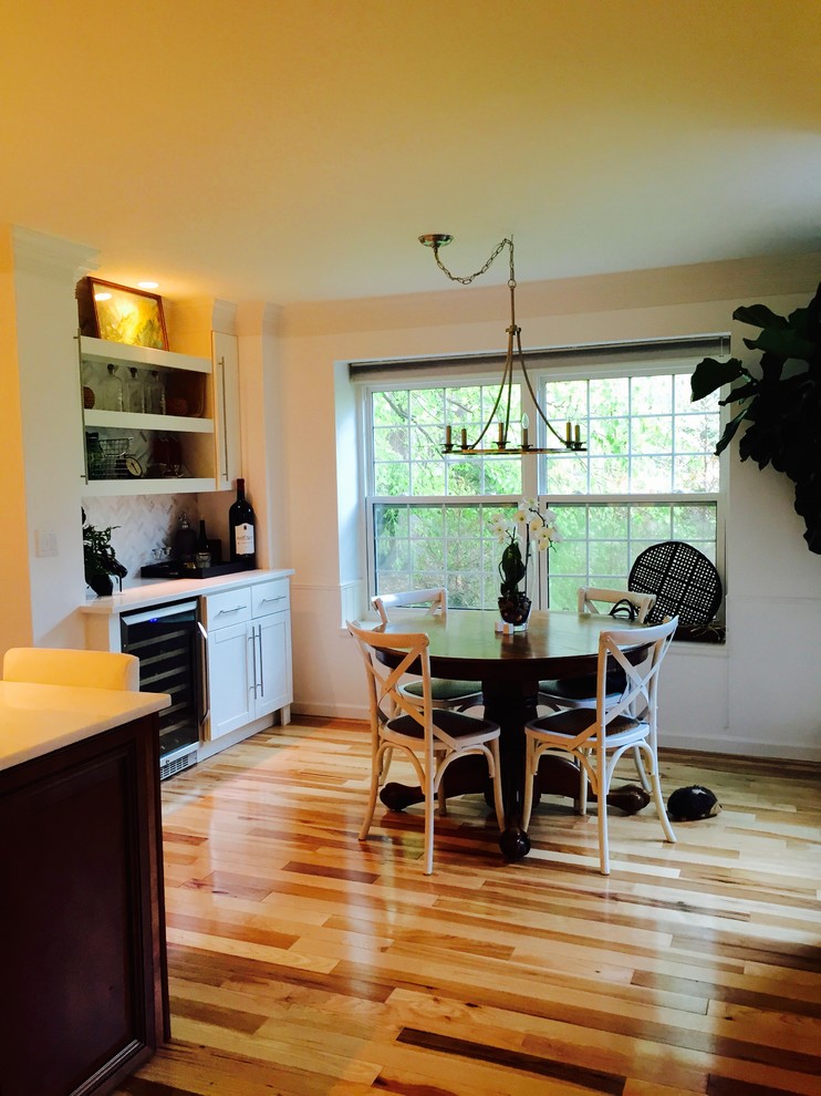 Example of a transitional home design design in Denver