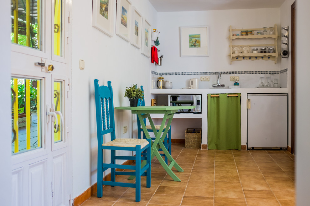 Photo of an eclectic kitchen in Malaga.