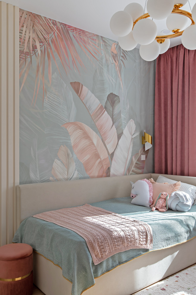 This is an example of a medium sized contemporary children’s room for girls in Other with beige walls, laminate floors, beige floors, wallpapered walls and a feature wall.