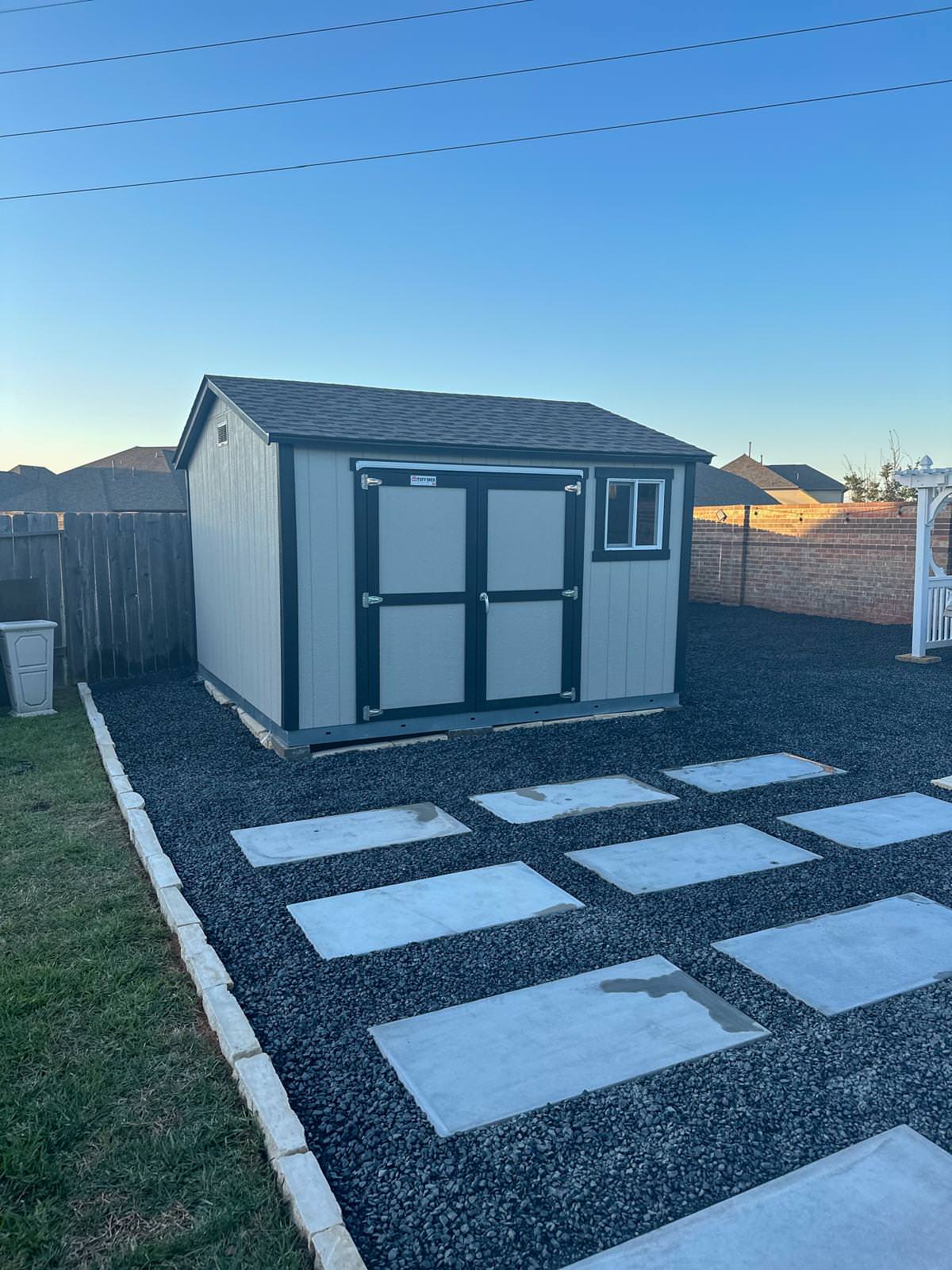 Backyard paver patio with gravel!