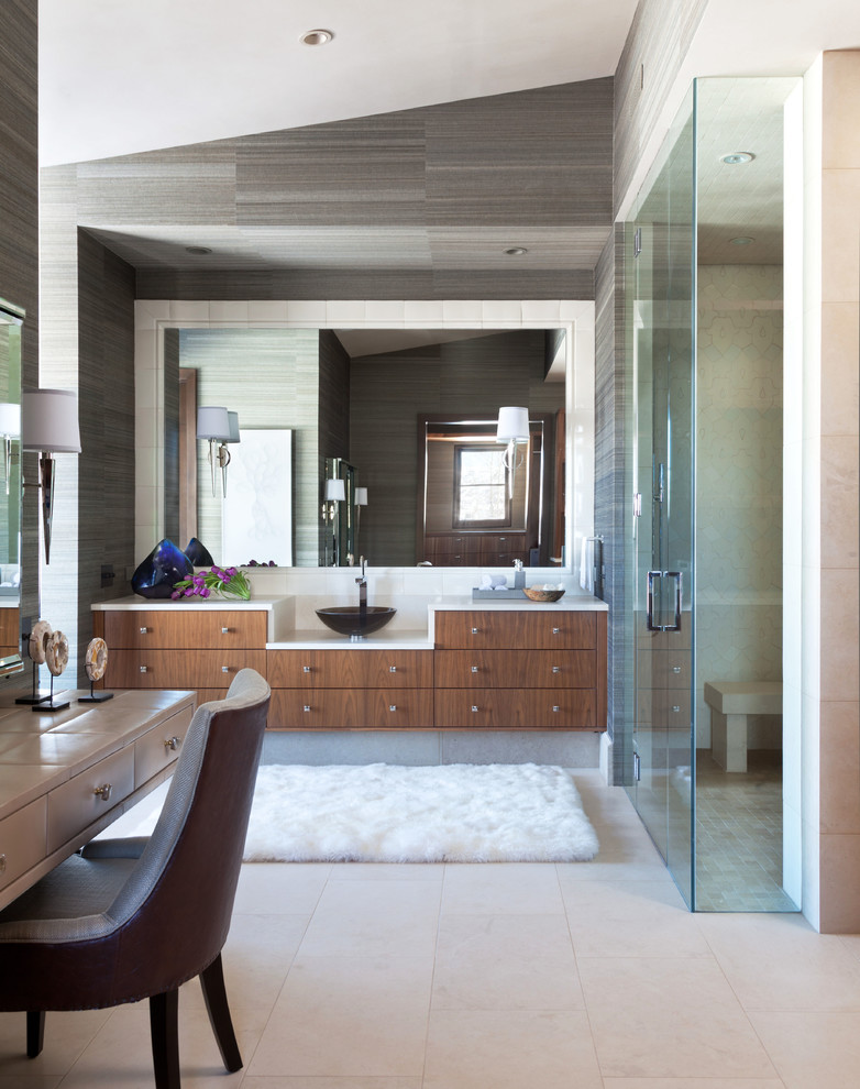 Inspiration for an expansive country master bathroom in Denver with a vessel sink, flat-panel cabinets, medium wood cabinets, limestone benchtops, white tile and porcelain tile.