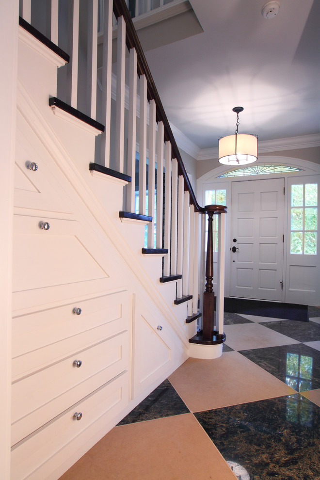 Mid-sized traditional foyer in Minneapolis with beige walls, limestone floors, a single front door and a white front door.