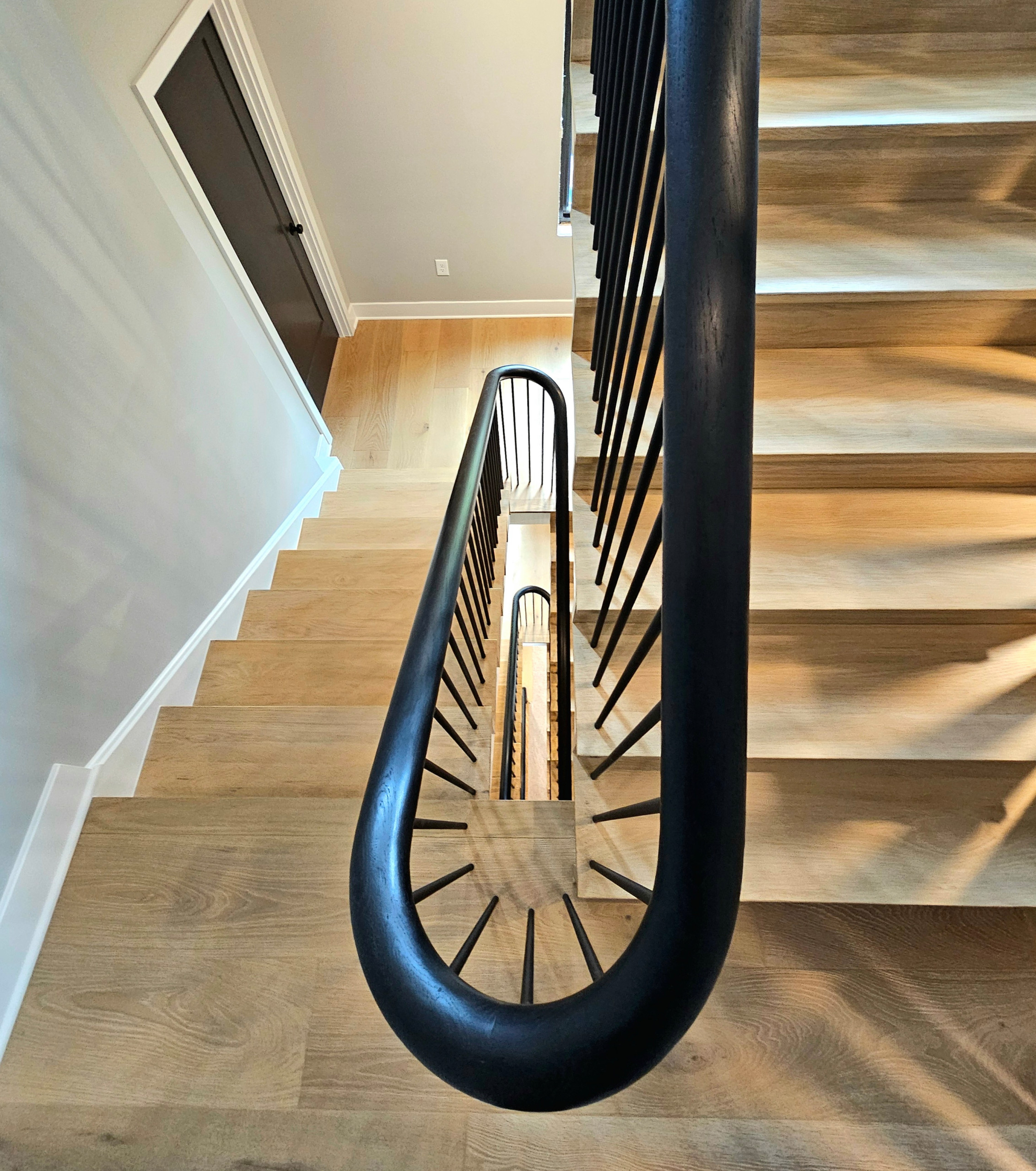 115_Stunning Continuous Rail System on 3 Story Floating Stairs; Arlington, VA 22