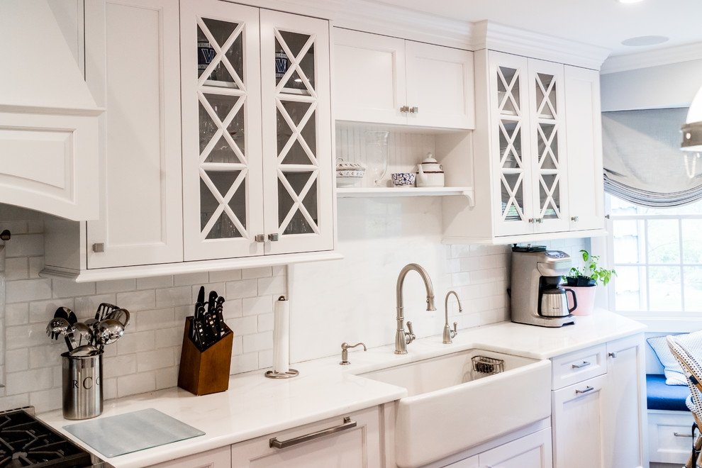 Example of a transitional kitchen design in New York