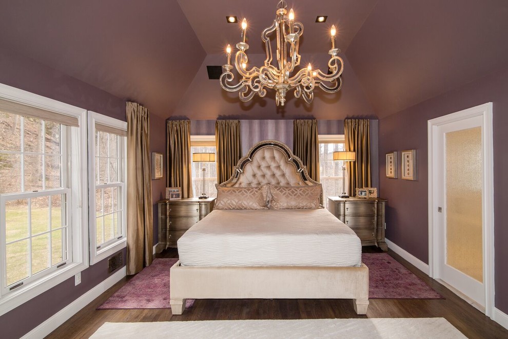 Inspiration for a large contemporary master bedroom in New York with purple walls, dark hardwood floors, no fireplace and brown floor.