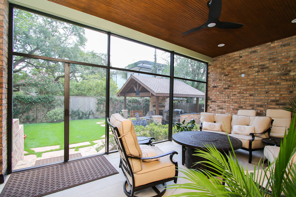 Inspiration for a large country sunroom in Houston with porcelain floors and beige floor.