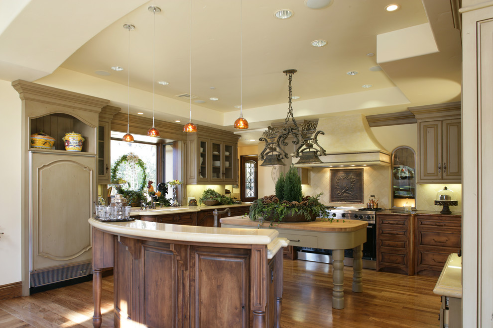Photo of a country kitchen in San Francisco with wood benchtops.