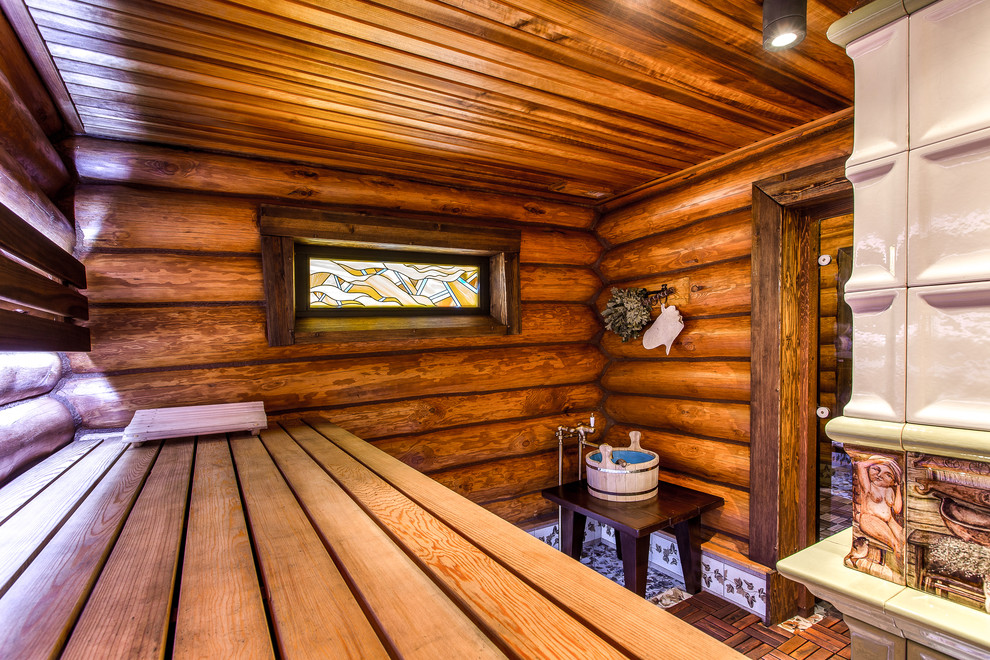 This is an example of a country bathroom in Other with with a sauna.