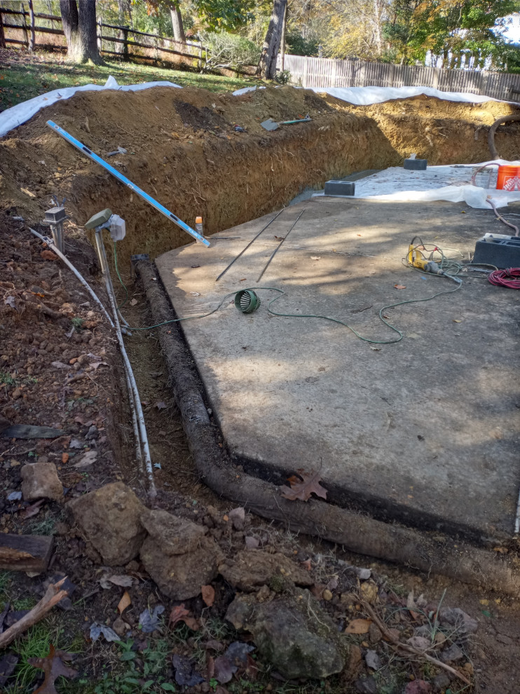STONE FIREPLACE  , BBQ GRILL   AND STONE RETAINING WALL