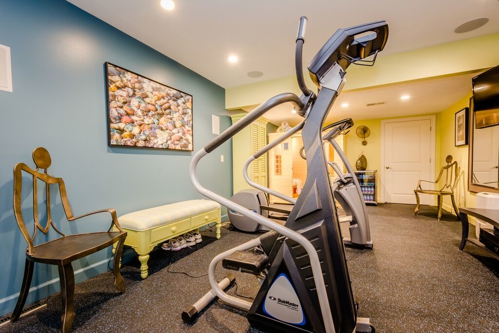 This is an example of a mid-sized transitional multipurpose gym in Chicago with multi-coloured walls and vinyl floors.
