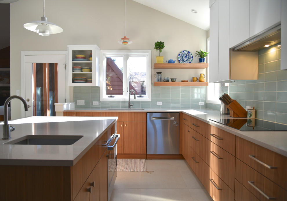 Design ideas for a mid-sized modern l-shaped kitchen pantry in Denver with a single-bowl sink, flat-panel cabinets, medium wood cabinets, quartz benchtops, green splashback, ceramic splashback, stainless steel appliances, porcelain floors, with island, beige floor and beige benchtop.