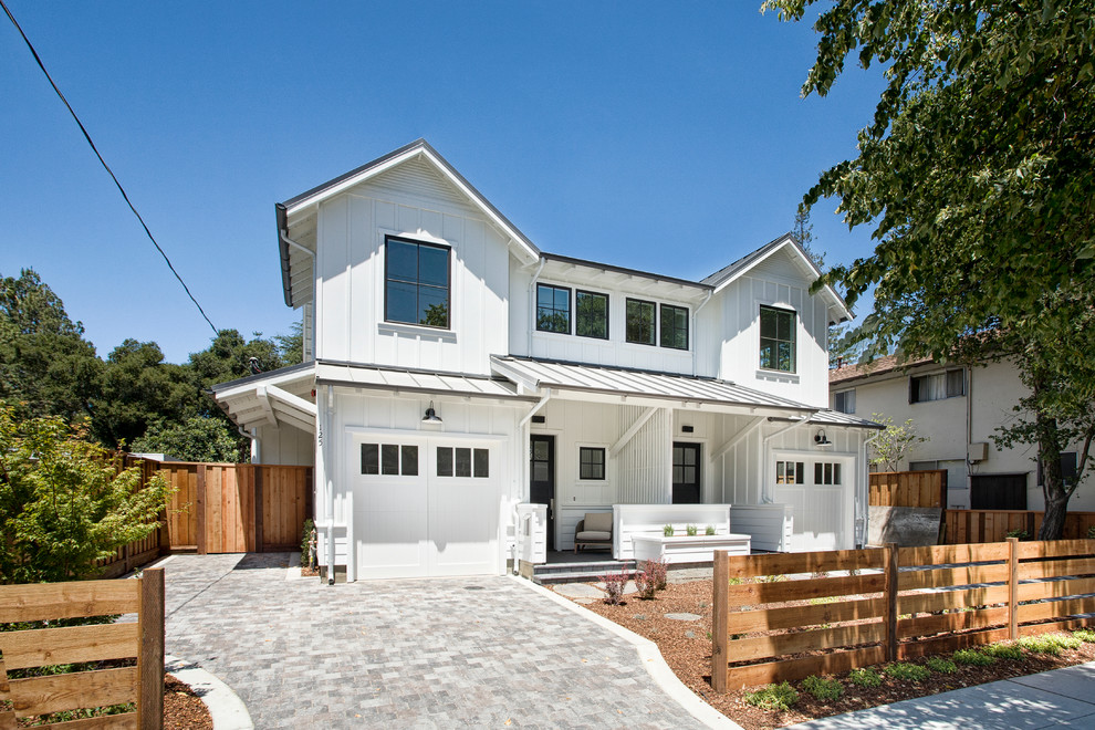 Design ideas for a mid-sized country two-storey white exterior in San Francisco with wood siding and a gable roof.