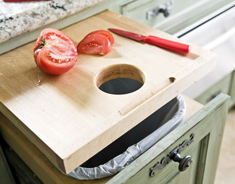 Pull-out cutting board over trash?