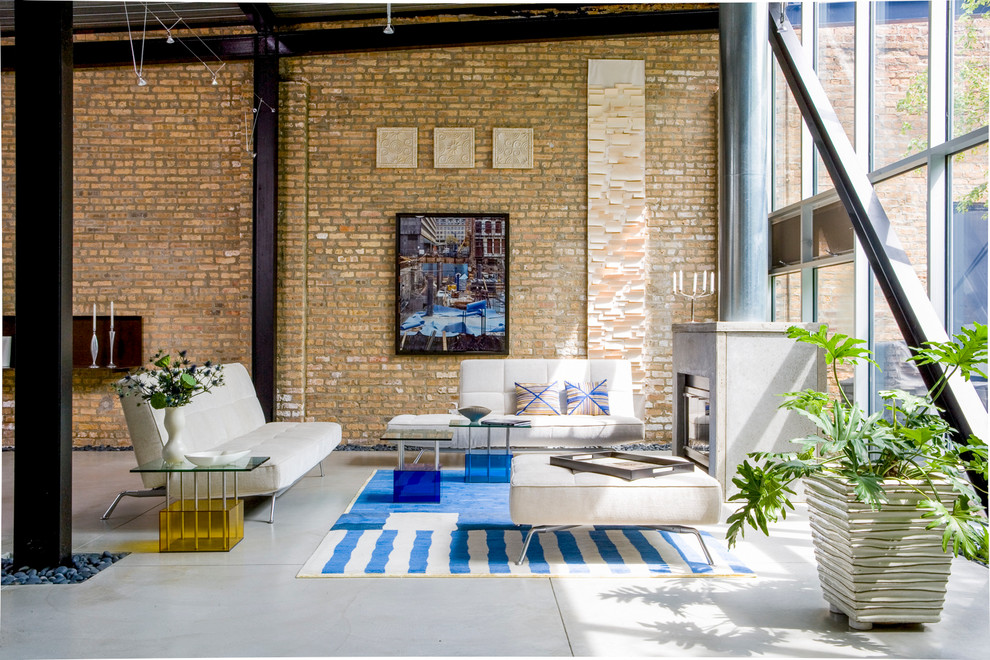 Inspiration for an industrial open concept living room in Chicago.