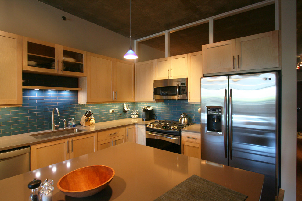 Inspiration for a large rustic l-shaped dark wood floor eat-in kitchen remodel in Chicago with an undermount sink, shaker cabinets, light wood cabinets, quartz countertops, blue backsplash, ceramic backsplash, stainless steel appliances and an island