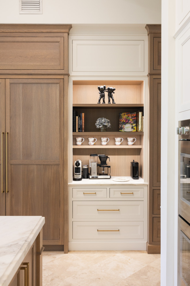 Inspiration for a transitional u-shaped kitchen remodel with an island