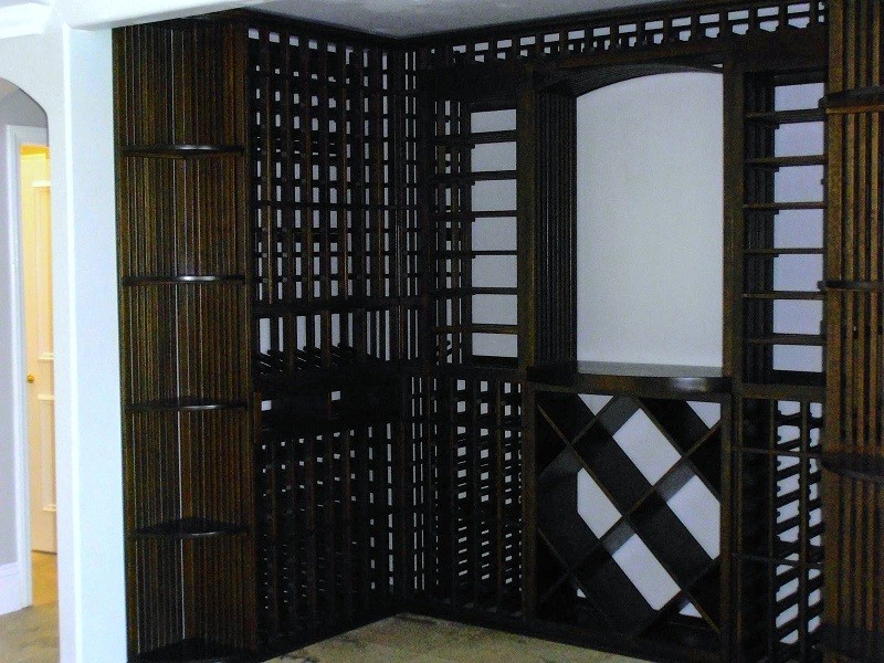 Design ideas for a mid-sized transitional wine cellar in Orange County with storage racks.