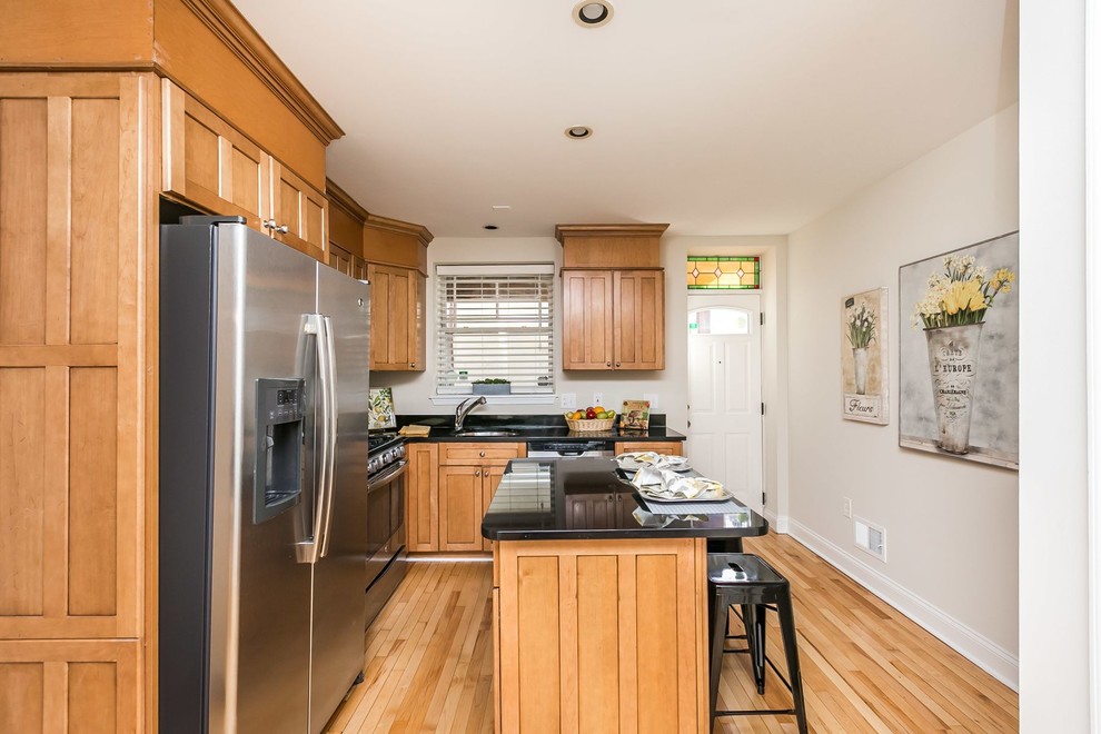 Example of a transitional home design design in Baltimore