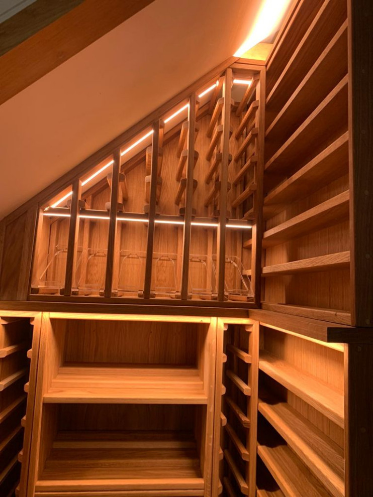This is an example of a small traditional wine cellar in Essex.