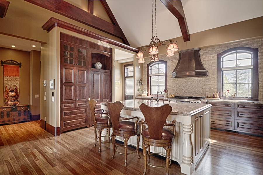 Example of a transitional kitchen design in Calgary