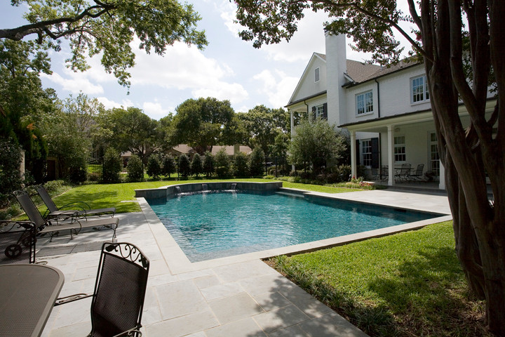 This is an example of a mid-sized contemporary backyard rectangular lap pool in Dallas.