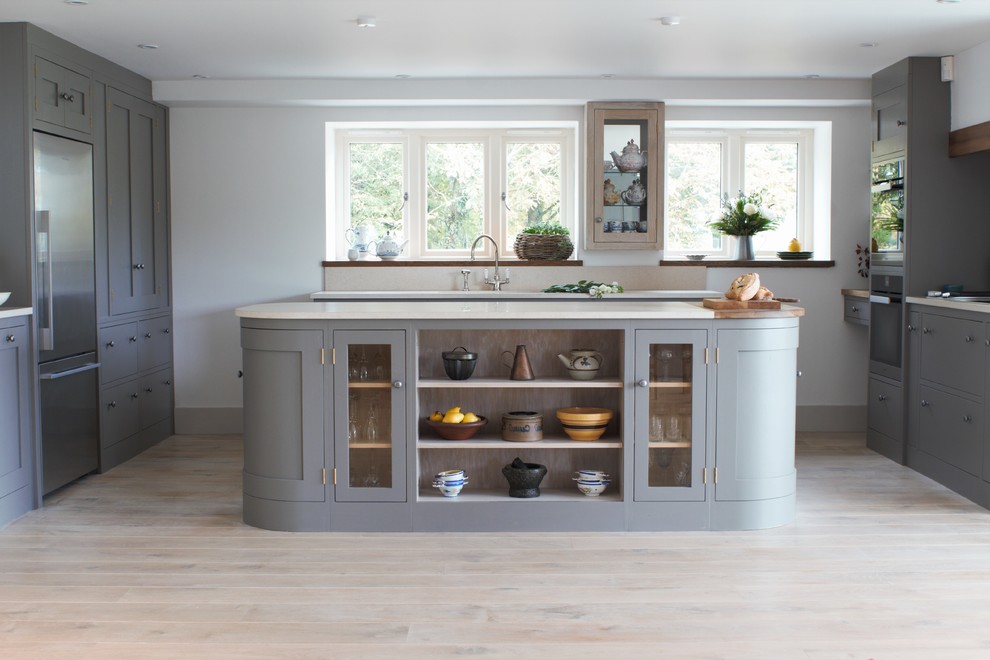 Design ideas for a mid-sized contemporary u-shaped open plan kitchen in Other with shaker cabinets, grey cabinets, marble benchtops, with island, stainless steel appliances and marble splashback.