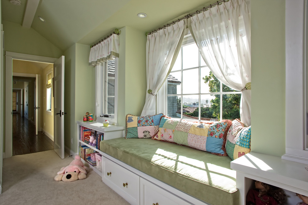 Traditional kids' room in San Diego with green walls and carpet for kids 4-10 years old.