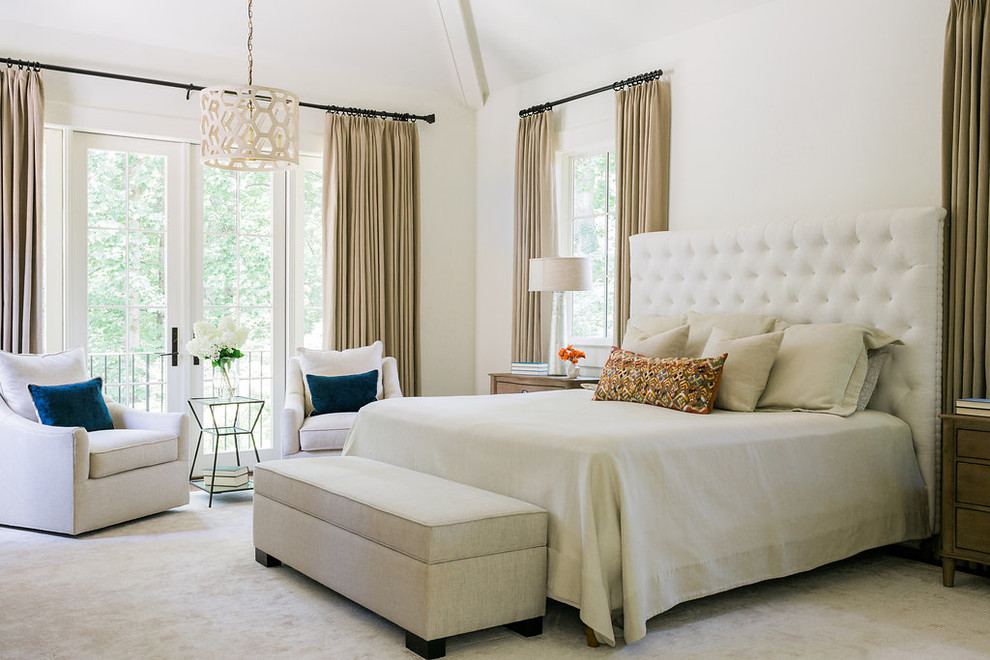 Design ideas for a transitional master bedroom in San Francisco with white walls and carpet.