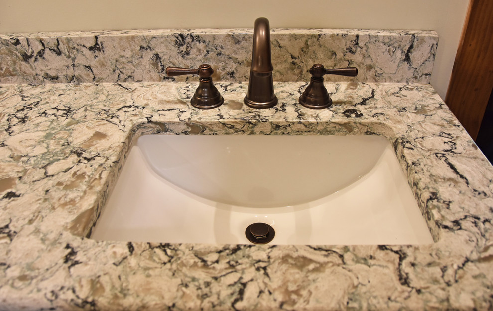 Inspiration for a rustic pebble tile floor home design remodel