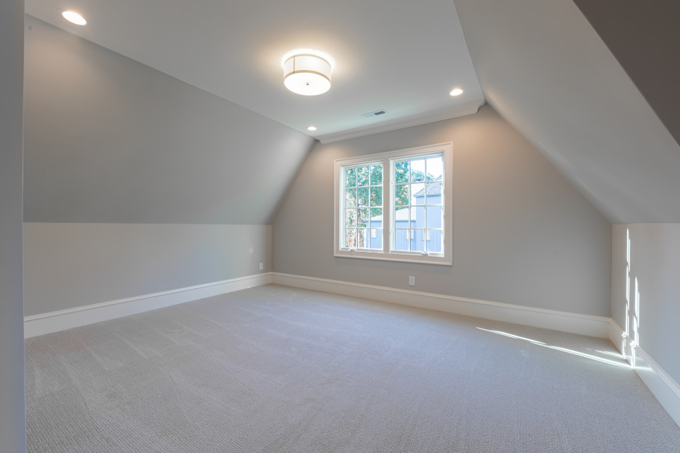 Example of a transitional home design design in Raleigh