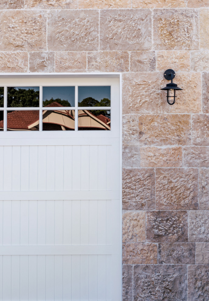 Beach style attached two-car garage in Sydney.