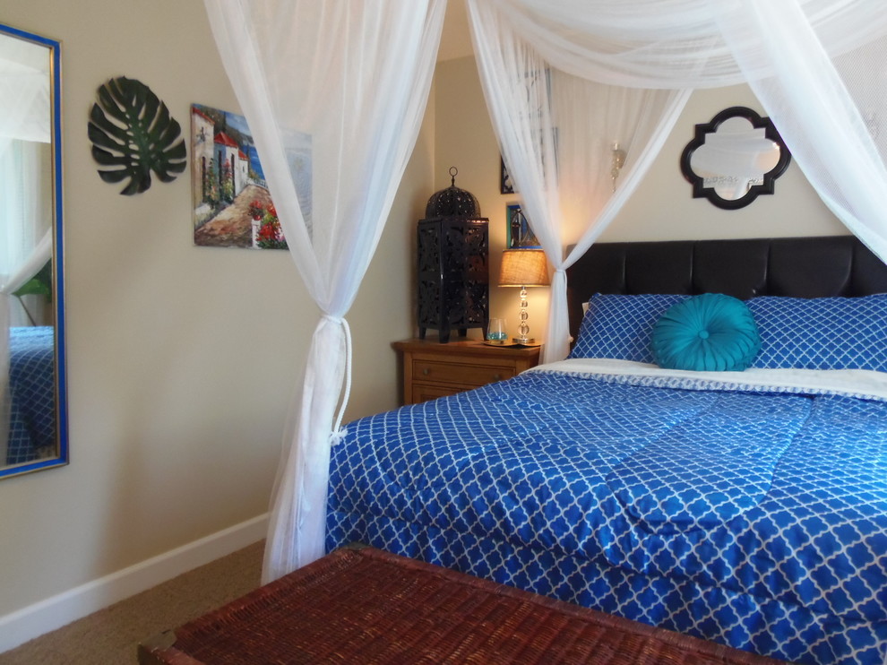 Example of an island style bedroom design in Portland