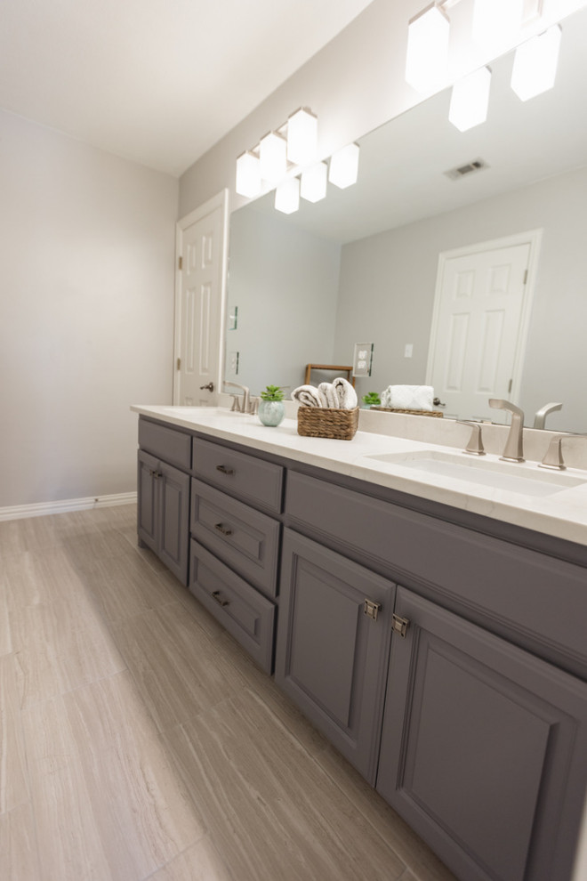 Design ideas for a medium sized traditional family bathroom in Dallas with raised-panel cabinets, grey cabinets, beige tiles, engineered stone worktops, white worktops, double sinks and a built in vanity unit.