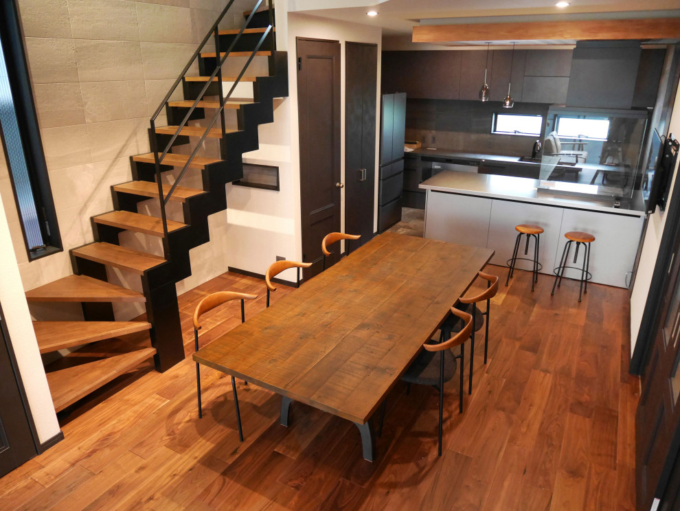 This is an example of a modern open plan dining room in Osaka with white walls, medium hardwood flooring, no fireplace, white floors, a wallpapered ceiling and wallpapered walls.