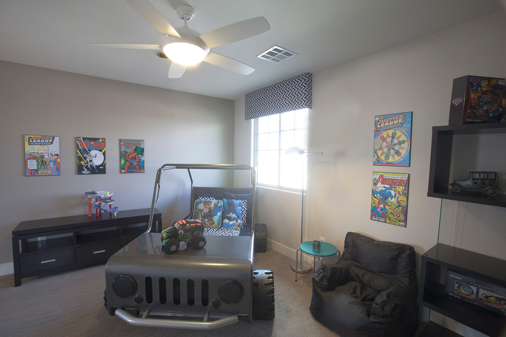 Design ideas for a mid-sized eclectic kids' bedroom for kids 4-10 years old and boys in Las Vegas with beige walls and carpet.